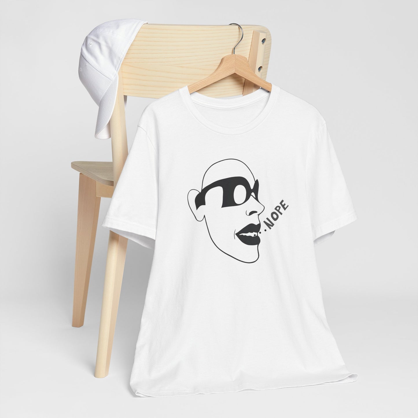 NOPE Graphic Tee — Minimalist Sunglasses Face Design (White)